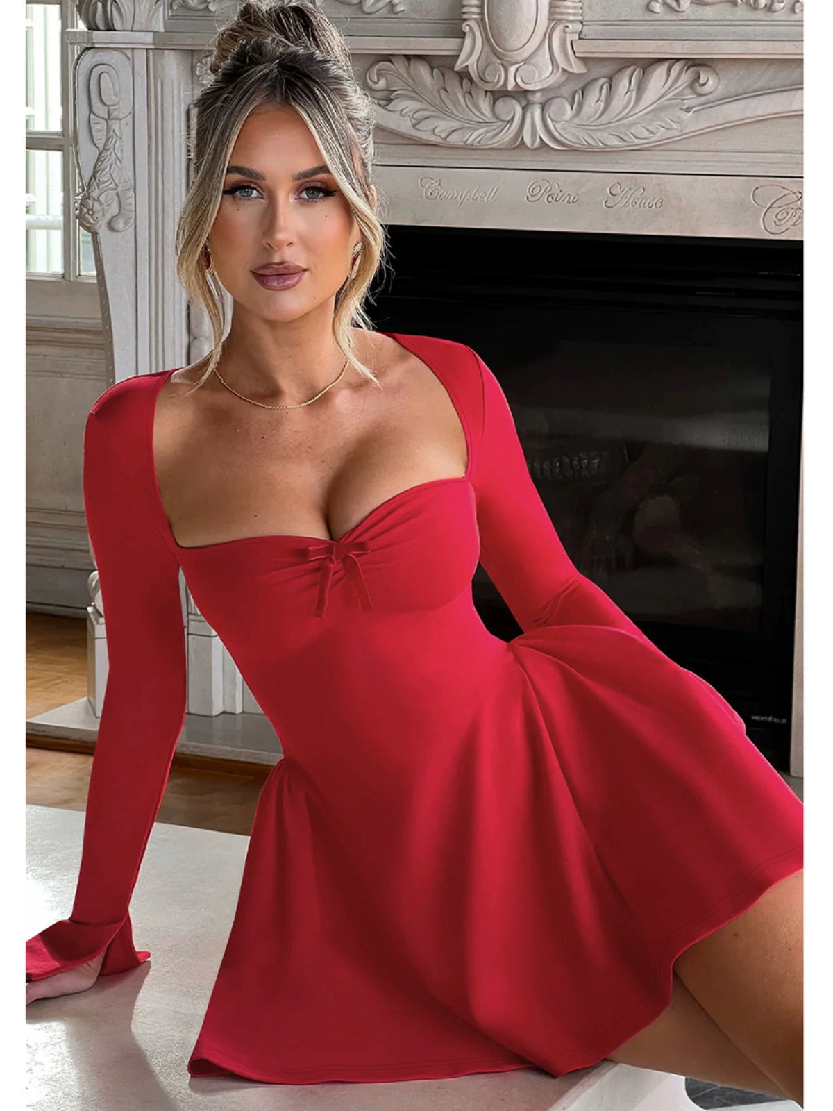 Shemoda: Alix Long-Sleeve Dress | Nüra - Discover the chic Alix Long-Sleeve Dress by Shemoda: a flirty mini with a fitted bodice, A-line skirt, and ruched sweetheart neckline. Perfect for evenings! - $24.00
