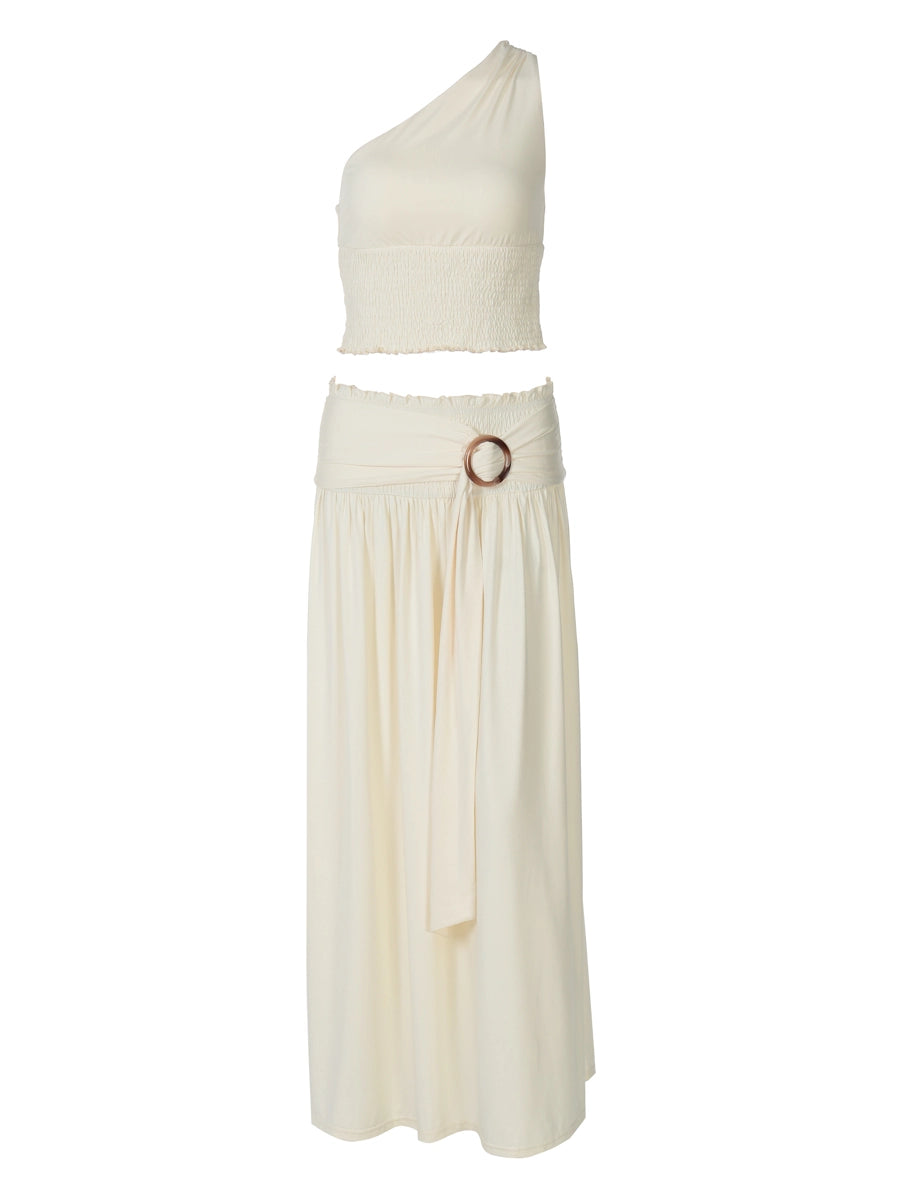 Shemoda: Empress Maxi Dress | Nüra - Elevate your style with Shemoda's Empress Maxi Dress. Featuring slanted shoulders and a slimming skirt for a confident, polished look. - $33.00
