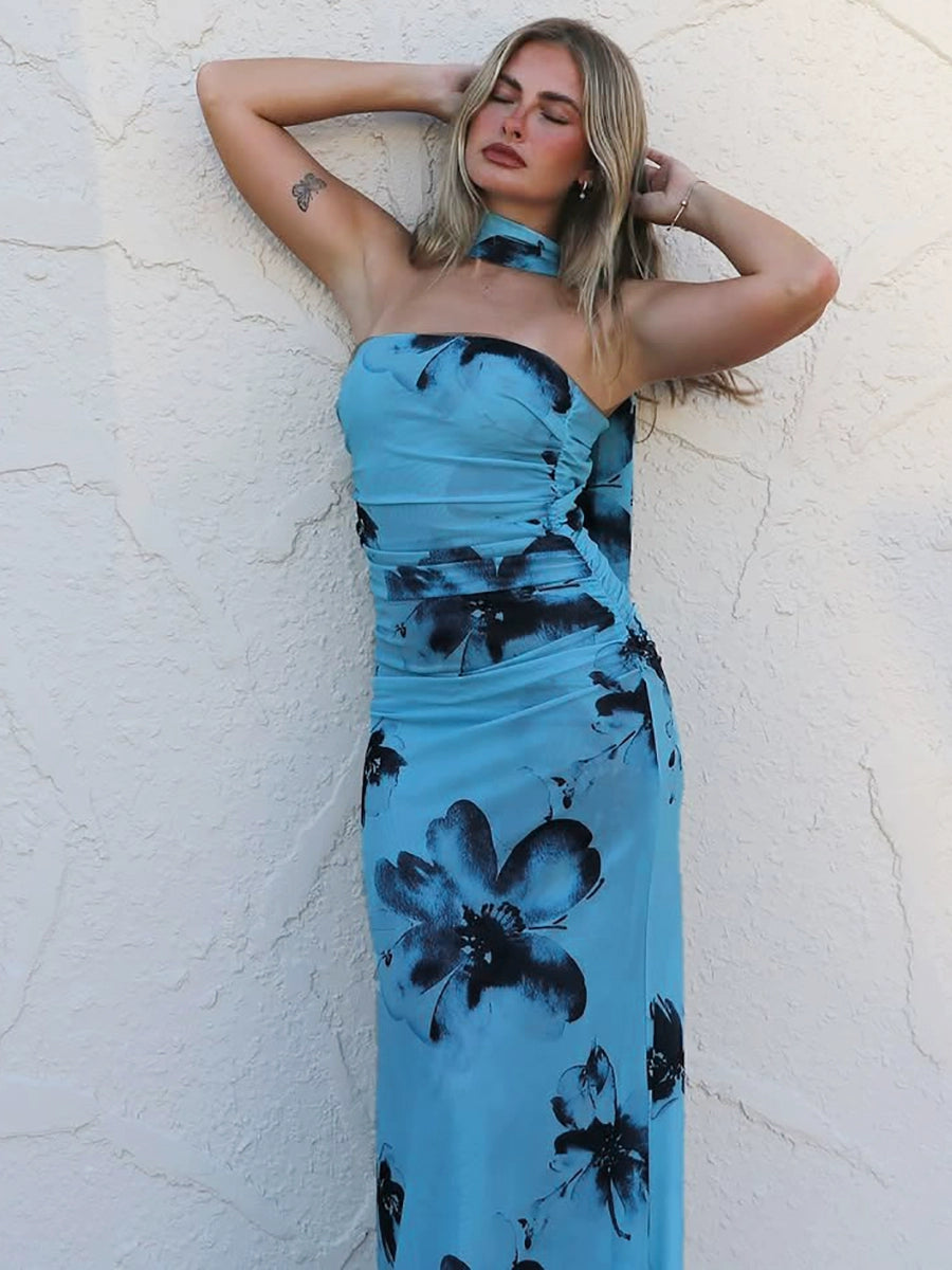 Shemoda: Sequoia Maxi Dress | Nüra - Elevate your style with Shemoda's Sequoia Maxi Dress. This floral halter-neck dress offers elegance and comfort for any summer event. - $28.00