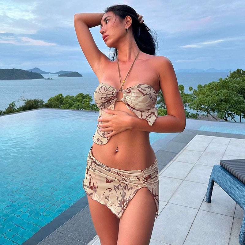 Shemoda: Saffron Sunburst Set | Nüra - Embrace summer in Shemoda's Saffron Sunburst Set: a chic mesh bikini with a bandeau top and ruched skirt. Perfect for sun-soaked days. - $19.00