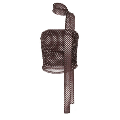 Shemoda: Kara Wrap Top | Nüra - Discover Shemoda's chic Kara Wrap Top: a polka dot crop with an asymmetric neckline, ruched sides, and a unique scarf-like neck strap. - $17.00