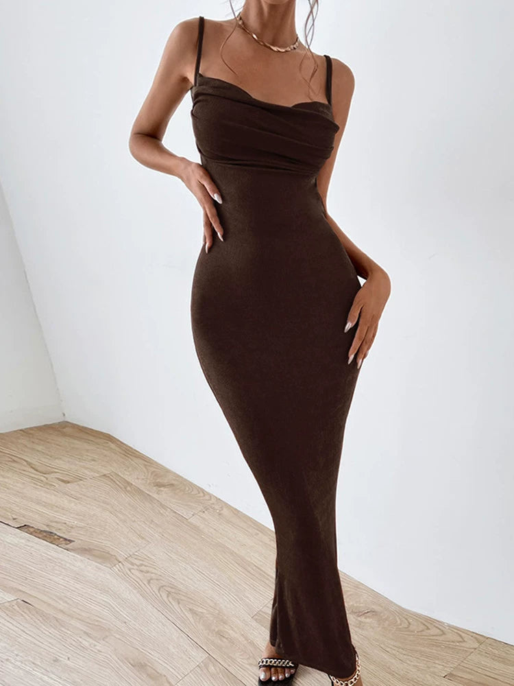 Shemoda: Lyra Slip Dress | Nüra - Discover elegance with Shemoda's Lyra Slip Dress: a sleek, backless design with a sweetheart neckline and tie waist, perfect for formal occasions. - $19.00
