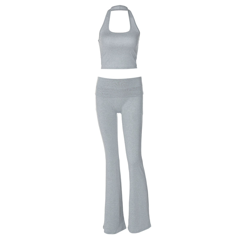Shemoda: Jolie Sporty Set | Nüra - Stay stylish in Shemoda's Jolie Sporty Set: a chic halter crop top and high-waist flared pants. Perfect for casual outings or sporty vibes. - $20.00