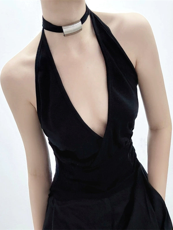 Shemoda: Skar Jade Top | Nüra - Discover Shemoda's Skar Jade Top: a chic black halter crop top with metal ring detail, open back, and subtle ruching for bold, versatile style. - $17.00
