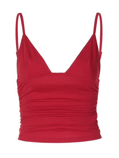 Shemoda: Lori Slim Tank - xs | Nüra - Discover Shemoda's Lori Slim Tank - XS: a chic crop-top with a plunging V-neck, ruched sides, and adjustable straps. Perfect for layering or solo wear. - $17.00