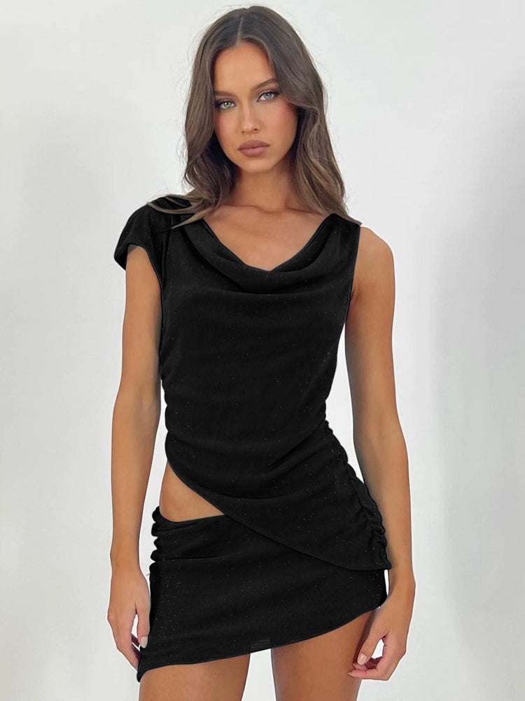 Shemoda: Xiara Asym Dress | Nüra - Elevate your style with Shemoda's Xiara Asym Dress. This chic two-piece set features a draped top and fitted mini skirt, perfect for any event. - $24.00