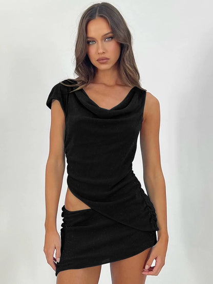 Shemoda: Xiara Asym Dress | Nüra - Elevate your style with Shemoda's Xiara Asym Dress. This chic two-piece set features a draped top and fitted mini skirt, perfect for any event. - $24.00