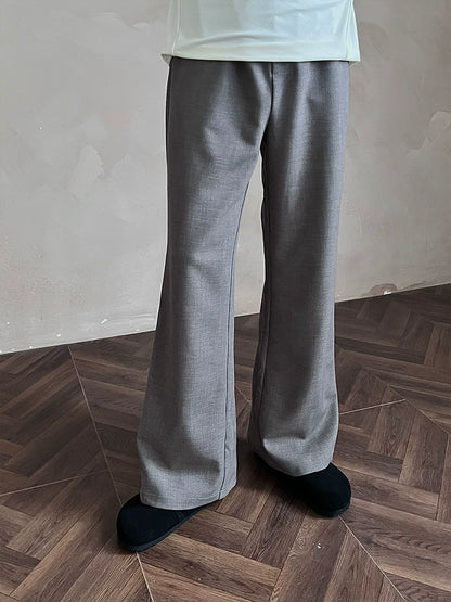 MUKHINA: Micro Flared Commuting Trousers | Nüra - Discover MUKHINA's Micro Flared Commuting Trousers: a chic blend of acetate and wool with a drawstring waist for comfort and style. Perfect for casual wear. - $78.00
