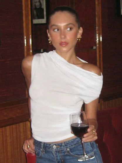 Shemoda: Talia Sleek Top | Nüra - Discover the Talia Sleek Top by Shemoda: a chic, one-shoulder design with ruched detail, perfect for any occasion. Stylish and versatile. - $19.00