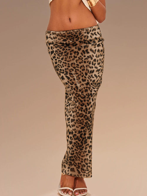 Shemoda: Briar Glow Pencil Skirt | Nüra - Elevate your style with Shemoda's Briar Glow Pencil Skirt. High-waisted, leopard print, and reflective finish for a bold, glamorous look. - $31.00
