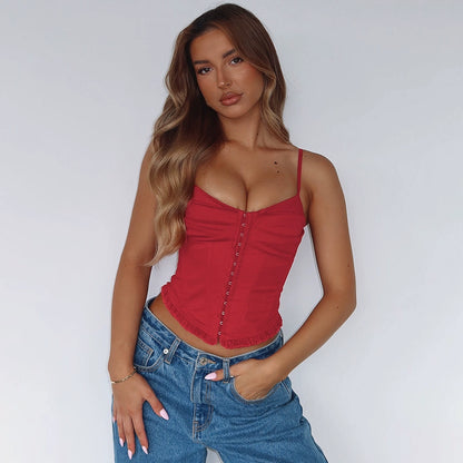 Shemoda: Vivienne Ruffle Top | Nüra - Discover the Vivienne Ruffle Top by Shemoda: a chic crop-top with lace hem and button detail, perfect for layering or wearing solo. - $24.00