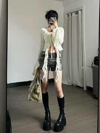 Shemoda: Fern Boho Top | Nüra - Discover Shemoda's Fern Boho Top: a long-sleeve, semi-transparent beauty with ruffles. Slim fit for a flattering silhouette. Perfect for any occasion! - $24.00