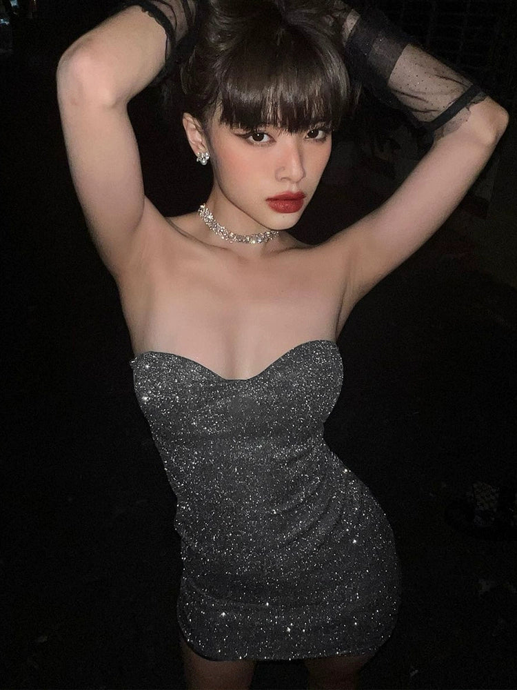 Shemoda: Evora Mini Dress | Nüra - Shine in style with Shemoda's Evora Mini Dress. Strapless, ruched, and glittery, it's perfect for parties with its sleek, flattering silhouette. - $17.00