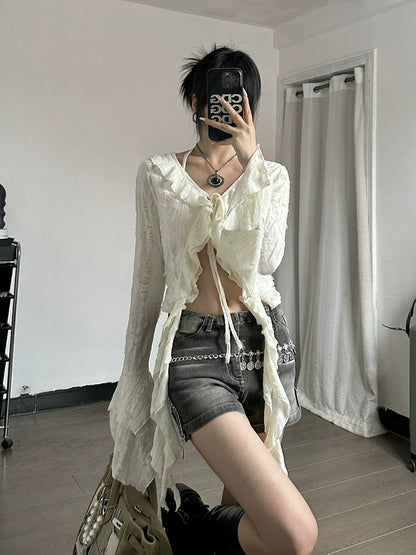 Shemoda: Fern Boho Top | Nüra - Discover Shemoda's Fern Boho Top: a long-sleeve, semi-transparent beauty with ruffles. Slim fit for a flattering silhouette. Perfect for any occasion! - $24.00