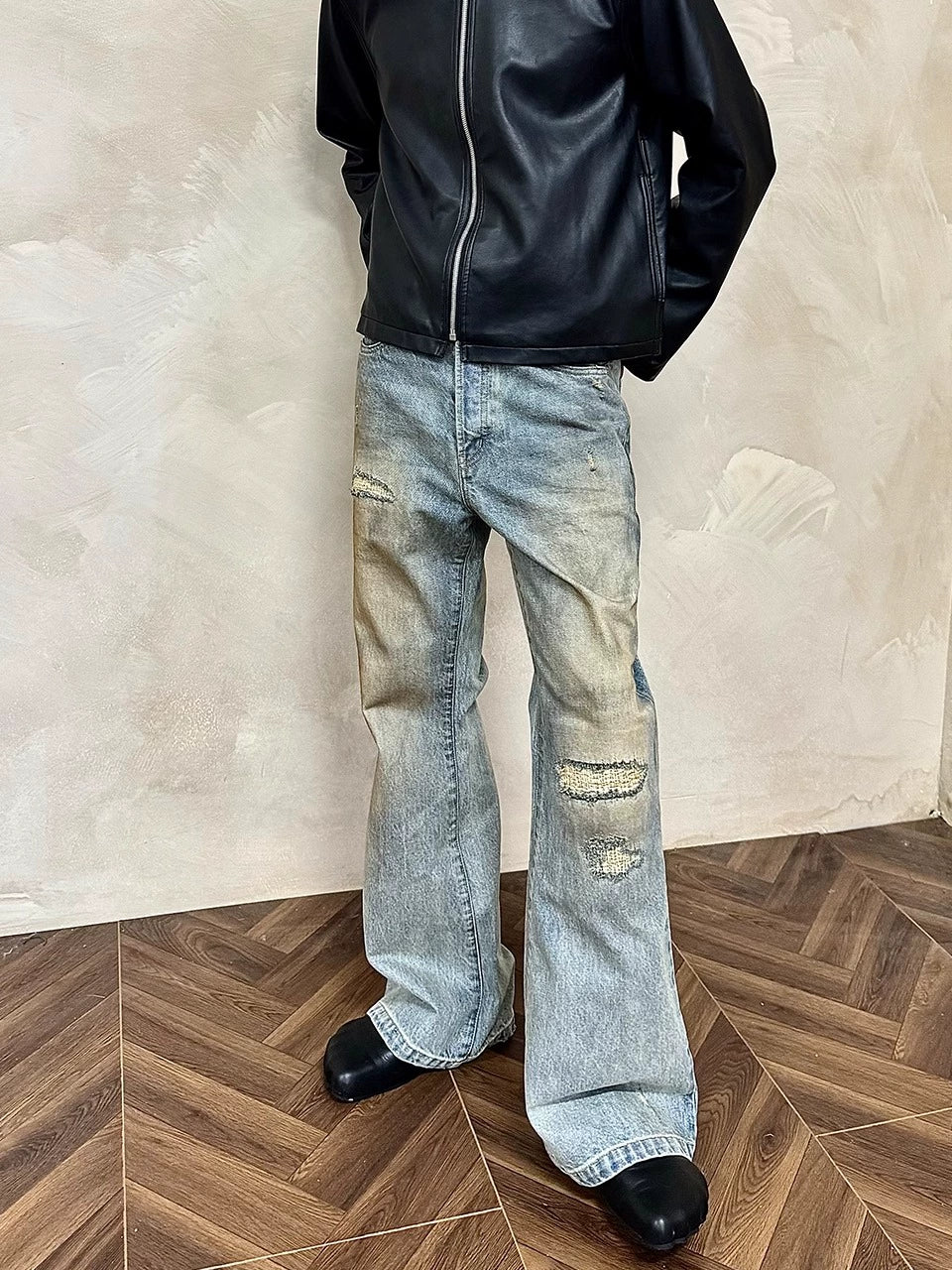 MUKHINA: Distressed Micro Brushed Flared Jeans | Nüra - Discover MUKHINA's Distressed Micro Brushed Flared Jeans for men, blending modern style with comfort. Perfect fit with a subtle distressed look. - $100.00