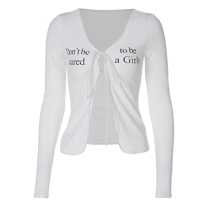 Shemoda: Romi Femme Cardigan | Nüra - Discover the Romi Femme Cardigan by Shemoda: a long, slim-fit lace top with a daring V-neck and stylish drawstring for a subtly sexy look. - $24.00