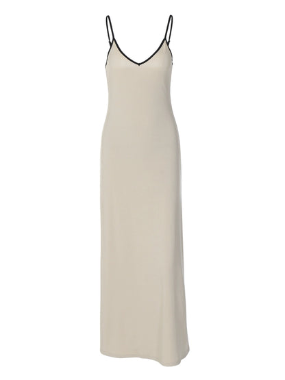 Shemoda: Lena V-neck Maxi Dress - xs | Nüra - Discover elegance with Shemoda's Lena V-neck Maxi Dress. XS size, minimalist style, perfect for summer or evening events. Shop now! - $19.00