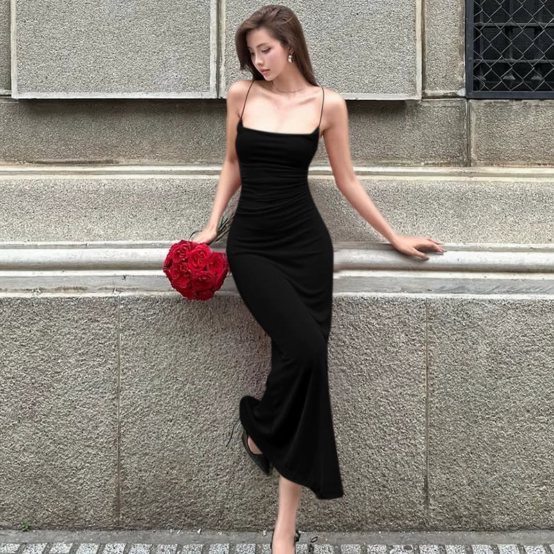 Shemoda: Elys Blush Gown | Nüra - Discover elegance with the Elys Blush Gown by Shemoda. A minimalist bodycon design with spaghetti straps for a romantic, polished look. - $23.00