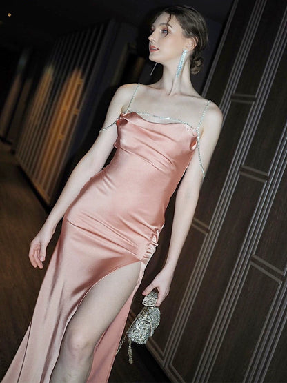 Shemoda: Clara Glamour Dress | Nüra - Discover elegance with Shemoda's Clara Glamour Dress. Floor-length, fitted silhouette, spaghetti straps, and a high side slit for a chic allure. - $21.00
