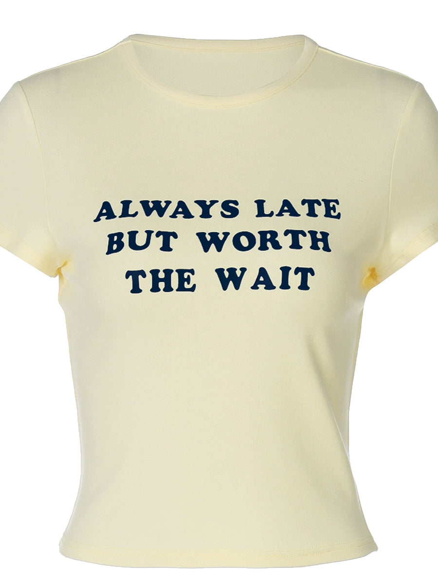 Shemoda: Lira Printed Tee | Nüra - Discover Shemoda's Lira Printed Tee: a chic, fitted crop with cheeky text. Perfectly pairs with high-waisted styles for a confident look. - $17.00