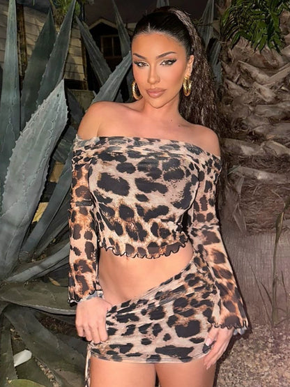 Shemoda: Jinx Jungle Set | Nüra - Unleash your wild side with Shemoda's Jinx Jungle Set: a leopard mesh off-shoulder top and drawstring skirt, perfect for bold, stylish women. - $22.00