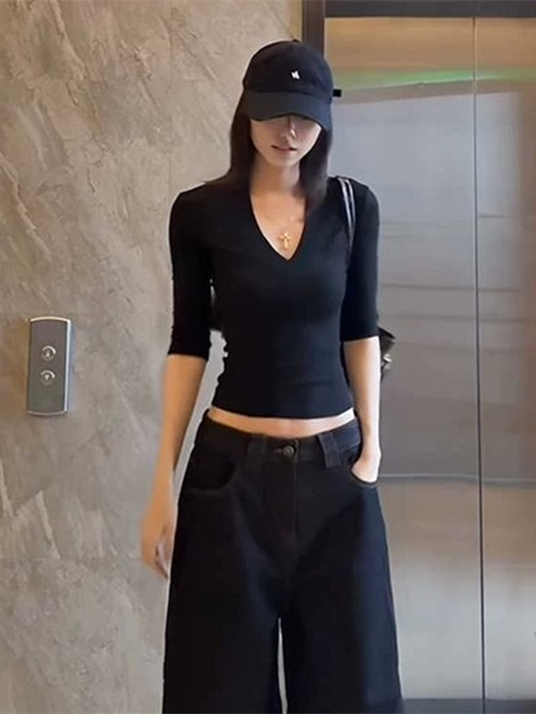 Shemoda: Ivy Luxe Crop | Nüra - Discover modern elegance with Shemoda's Ivy Luxe Crop. Featuring a sexy deep V-neck and fitted fabric, it's perfect for stylish casual or semi-formal looks. - $19.00