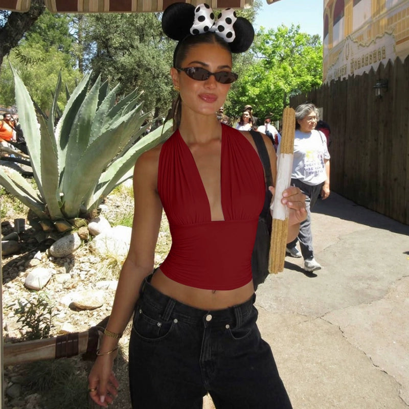 Shemoda: Lana Sleek Top | Nüra - Discover the Lana Sleek Top by Shemoda: a stylish, sexy crop-top with a deep V-neck and bareback design, perfect for summer layering or solo wear. - $17.00