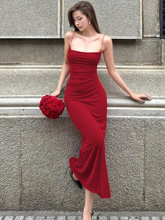 Shemoda: Elys Blush Gown | Nüra - Discover elegance with the Elys Blush Gown by Shemoda. A minimalist bodycon design with spaghetti straps for a romantic, polished look. - $23.00