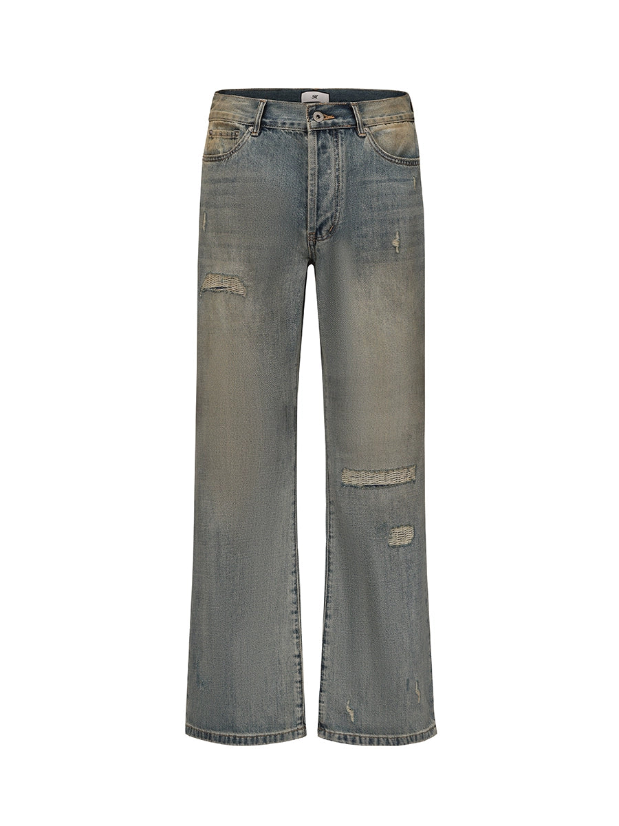 MUKHINA: Distressed Micro Brushed Flared Jeans | Nüra - Discover MUKHINA's Distressed Micro Brushed Flared Jeans for men, blending modern style with comfort. Perfect fit with a subtle distressed look. - $100.00
