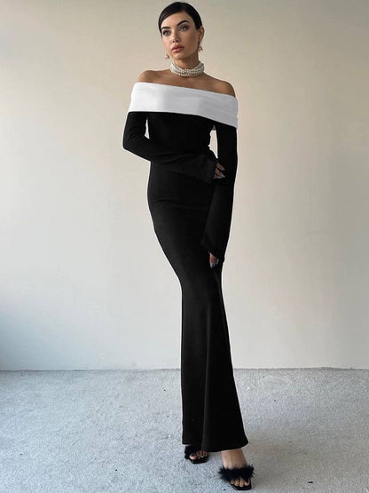 Shemoda: Pia Classic Dress | Nüra - Elevate your style with Shemoda's Pia Classic Dress. Elegant black gown, white off-shoulder neckline, long sleeves, and a flattering silhouette. - $20.00