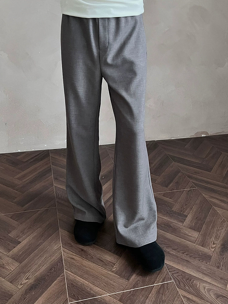 MUKHINA: Micro Flared Commuting Trousers | Nüra - Discover MUKHINA's Micro Flared Commuting Trousers: a chic blend of acetate and wool with a drawstring waist for comfort and style. Perfect for casual wear. - $78.00