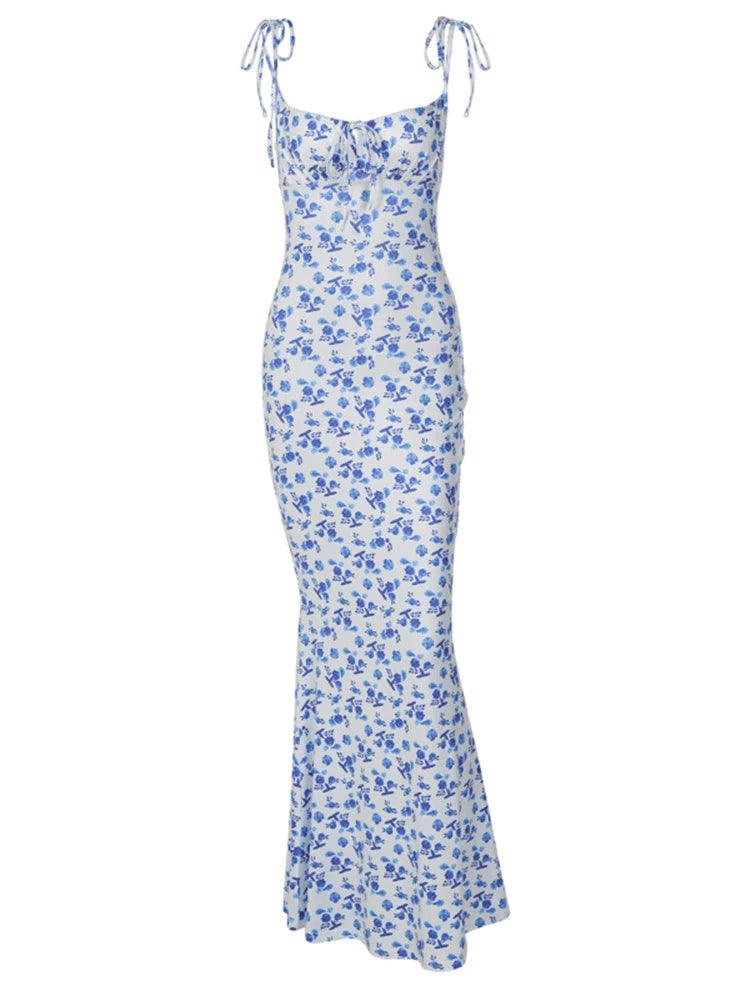 Shemoda: Dawn Floral Dress | Nüra - Chic summer style with Shemoda's Dawn Floral Dress: high waist, slim fit, blue flowers, bow straps, ruched neckline, and fishtail skirt. - $22.00