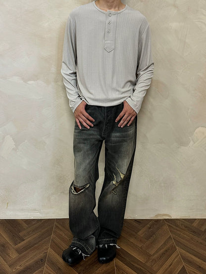 MUKHINA: Damaged Loose Straight Fit Jeans | Nüra - Discover MUKHINA's Damaged Loose Straight Fit Jeans with unique black & yellow detailing and tassel patches for a trendy, authentic style. - $92.00