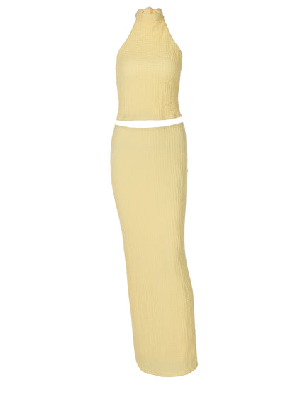 Shemoda: Nira Knit Dress Set | Nüra - Elevate your style with Shemoda's Nira Knit Dress Set: a chic sleeveless crop top and high-waist skirt, perfect for a sleek, elegant look. - $31.00