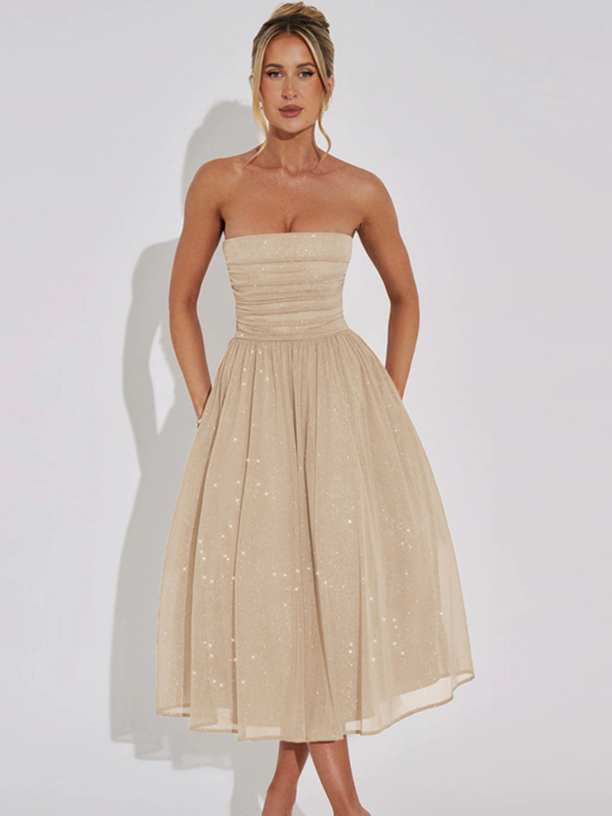 Shemoda: Korra Strapless Dress | Nüra - Elevate your style with Shemoda's Korra Strapless Dress. Sequin mesh bodice, A-line silhouette, perfect for festive and evening occasions. - $30.00