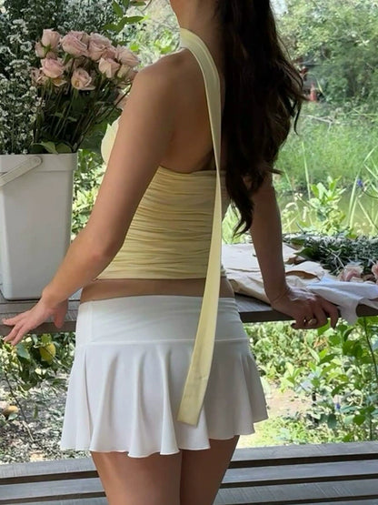 Shemoda: Chloe Tube Top | Nüra - Stay cool and stylish this summer with Shemoda's Chloe Tube Top. Strapless, ruched, and ribboned for a flattering, chic look. Perfect for any occasion! - $17.00