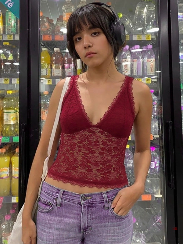 Shemoda: Claire Lace Camisole | Nüra - Discover Shemoda's Claire Lace Camisole: a chic crop-top with floral lace, deep V-neck, and scalloped hem. Perfect for elegant summer style. - $19.00