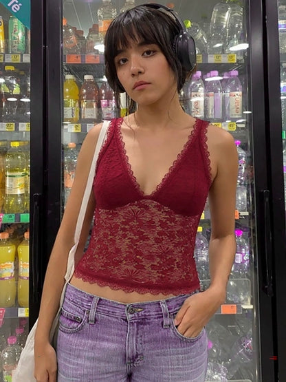 Shemoda: Claire Lace Camisole | Nüra - Discover Shemoda's Claire Lace Camisole: a chic crop-top with floral lace, deep V-neck, and scalloped hem. Perfect for elegant summer style. - $19.00
