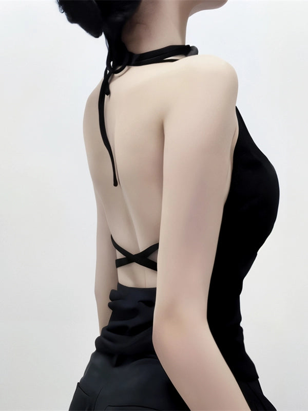 Shemoda: Skar Jade Top | Nüra - Discover Shemoda's Skar Jade Top: a chic black halter crop top with metal ring detail, open back, and subtle ruching for bold, versatile style. - $17.00