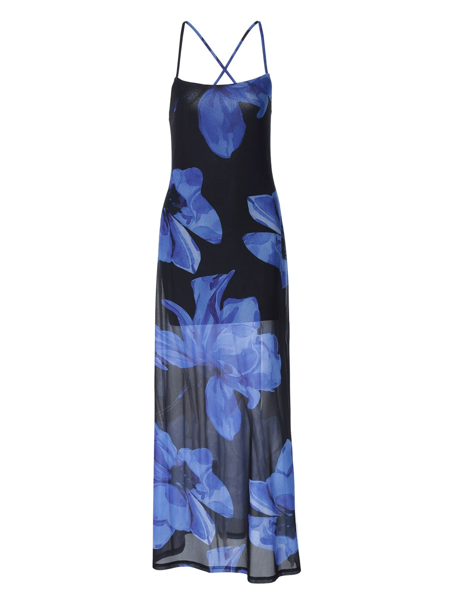 Shemoda: Meadow Dew Maxi Dress | Nüra - Discover the Meadow Dew Maxi Dress by Shemoda: a sleek, sexy vacation style with blue floral print, crisscross back, and fitted silhouette. - $21.00