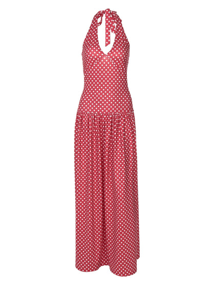 Shemoda: Ella Retro Dress | Nüra - Discover the Ella Retro Dress by Shemoda: a halter-neck polka dot maxi with a tie neck and flowy skirt, perfect for beach days and chic summer parties. - $24.00