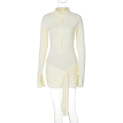 Shemoda: Lexi Shirt Dress | Nüra - Discover elegance with Shemoda's Lexi Shirt Dress. Featuring a slimming fit, classic collar, and asymmetrical ruched hem for a chic look. - $30.00