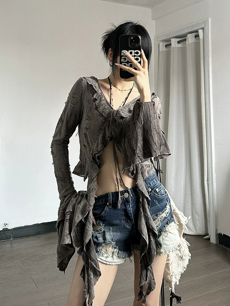 Shemoda: Fern Boho Top | Nüra - Discover Shemoda's Fern Boho Top: a long-sleeve, semi-transparent beauty with ruffles. Slim fit for a flattering silhouette. Perfect for any occasion! - $24.00