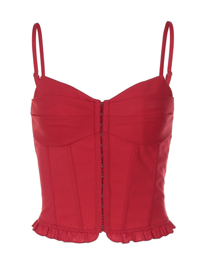 Shemoda: Vivienne Ruffle Top | Nüra - Discover the Vivienne Ruffle Top by Shemoda: a chic crop-top with lace hem and button detail, perfect for layering or wearing solo. - $24.00